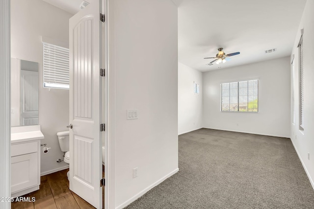 9017 E June Cir, Mesa, AZ 85207 - unfurnished room featuring a ceiling fan and baseboards