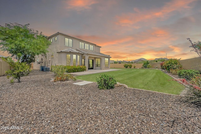 9017 E June Cir, Mesa, AZ 85207 - back of house featuring stucco siding, cooling unit, a tiled roof, and a patio area