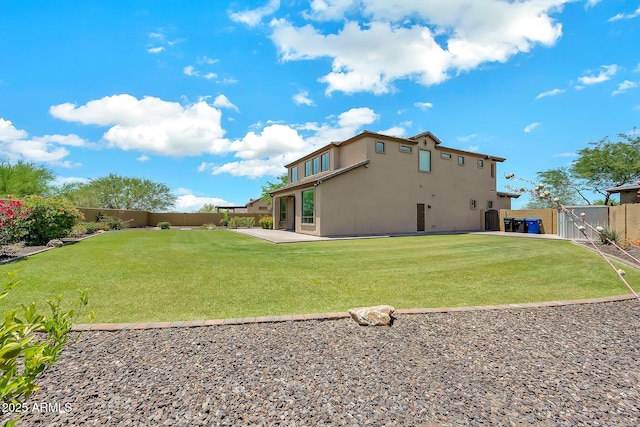 9017 E June Cir, Mesa, AZ 85207 - back of house featuring a gate, stucco siding, and a patio