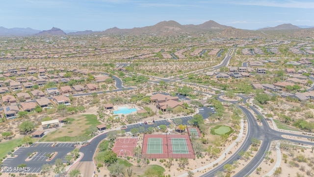 9017 E June Cir, Mesa, AZ 85207 - aerial view of property's location with mountains, nearby suburban area, and a pool area
