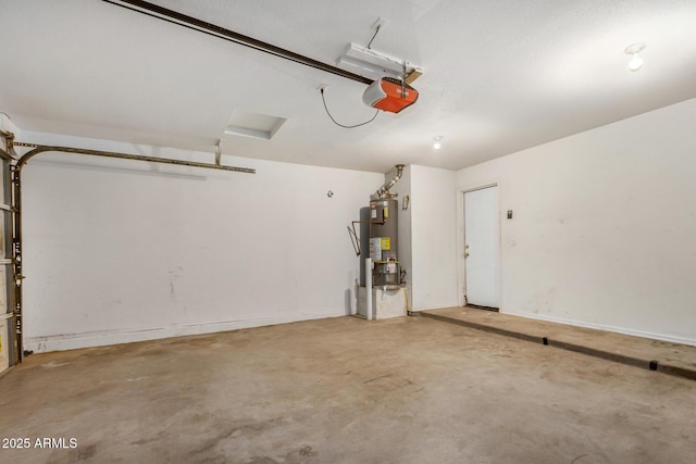 garage featuring gas water heater and a garage door opener