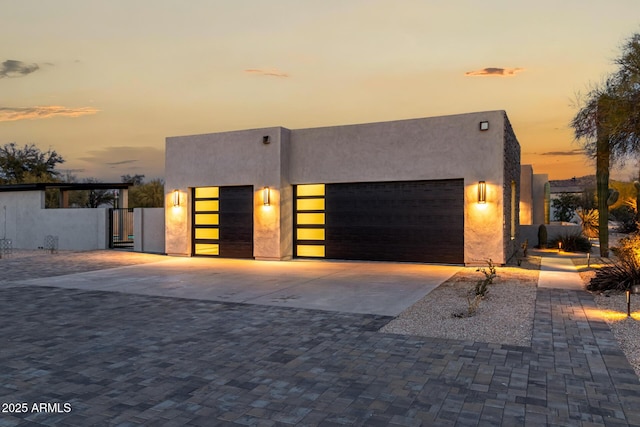 view of front of property featuring a garage