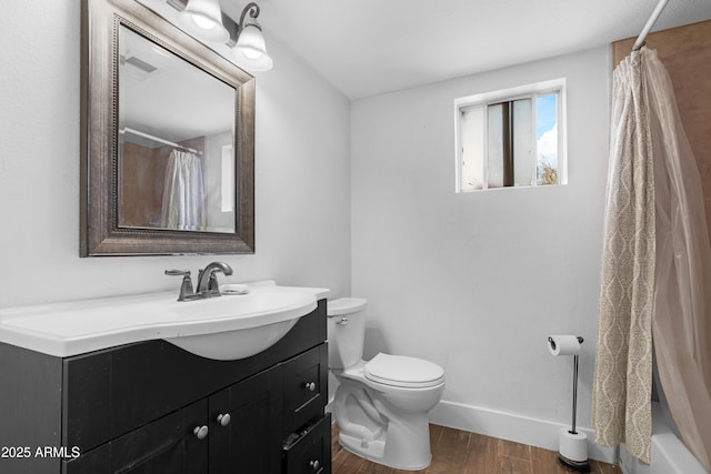 full bath with wood finished floors, baseboards, vanity, toilet, and a shower with shower curtain
