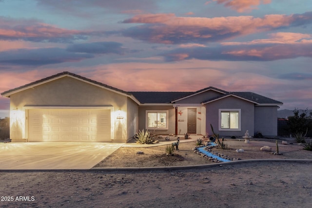 single story home featuring a garage