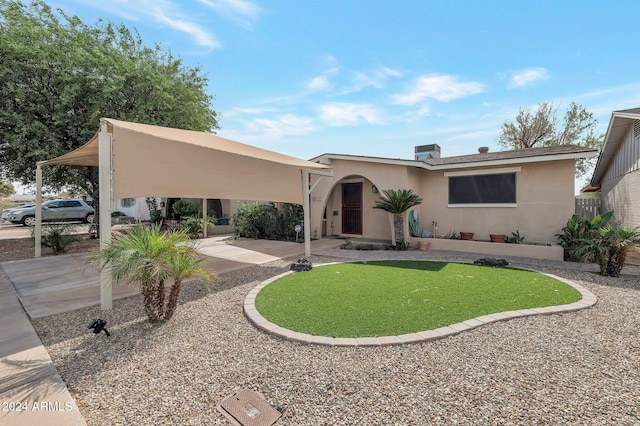 view of front of property featuring stucco siding