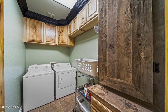 21909 W Beacon Ln, Wittmann, AZ 85361 - laundry room featuring cabinet space, tile patterned floors, and washer and clothes dryer