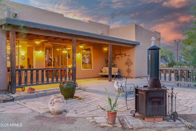 21909 W Beacon Ln, Wittmann, AZ 85361 - back of property featuring stucco siding and a patio area