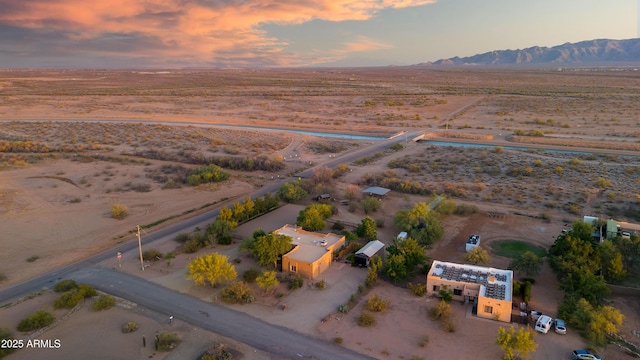 21909 W Beacon Ln, Wittmann, AZ 85361 - aerial view at dusk with a rural view, a mountain view, and view of desert