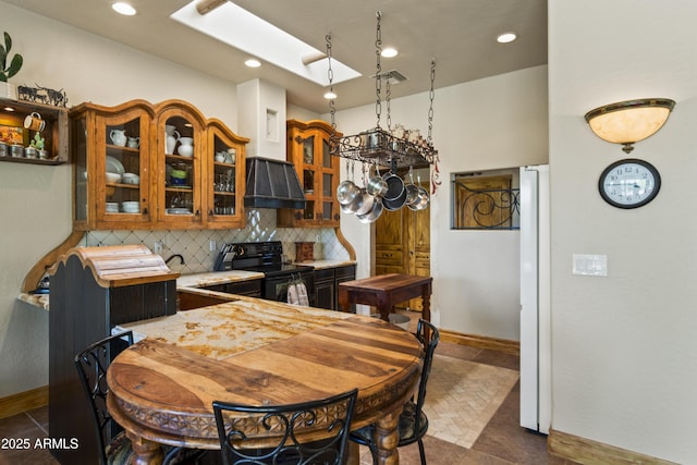 21909 W Beacon Ln, Wittmann, AZ 85361 - dining area with a skylight, baseboards, recessed lighting, and visible vents
