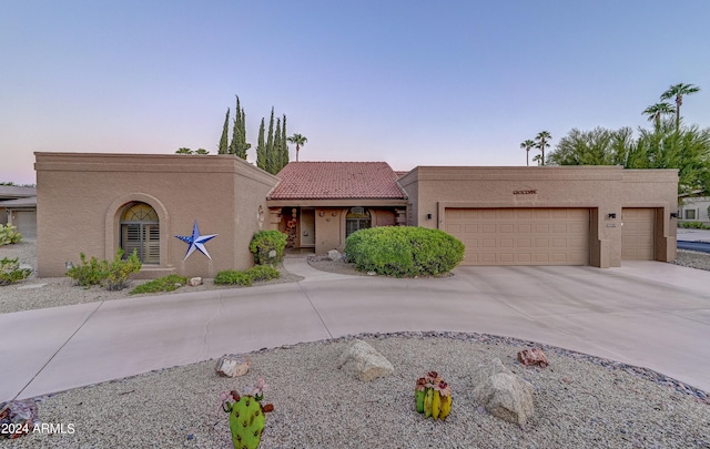 view of front of house with a garage