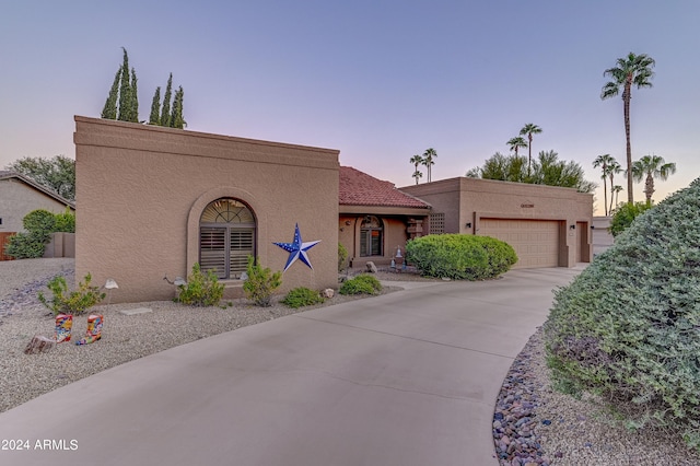 view of front of home with a garage