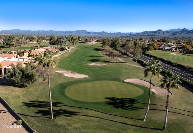 surrounding community with a mountain view