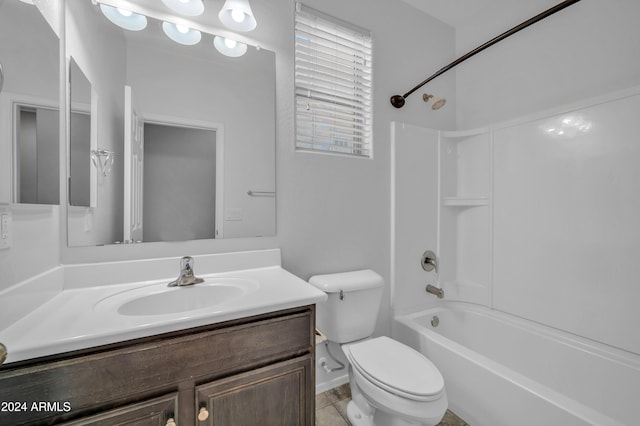 full bathroom featuring tile patterned floors, vanity, shower / bath combination, and toilet