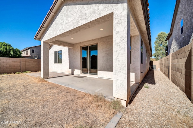 rear view of house with a patio area