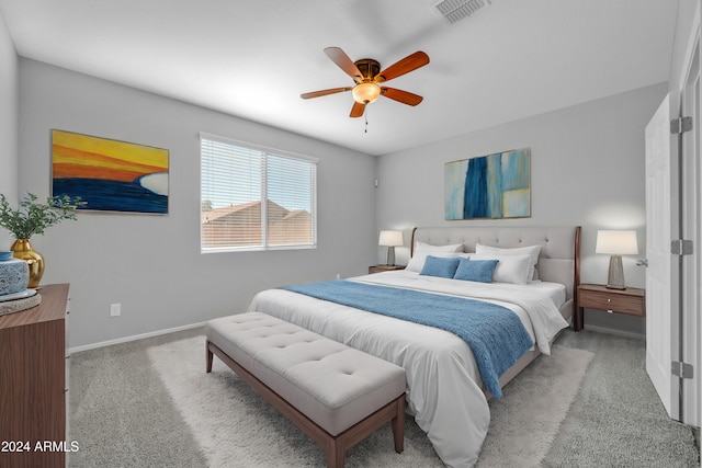 carpeted bedroom with ceiling fan