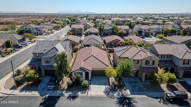 drone / aerial view featuring a mountain view