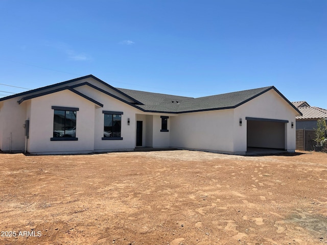 5499 E Red Bird Ln, San Tan Valley, AZ 85140 - view of front of property featuring a garage and stucco siding