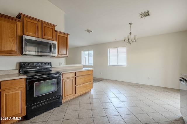 kitchen with hanging light fixtures, light tile patterned floors, black / electric stove, and a notable chandelier