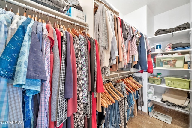 spacious closet with tile patterned flooring