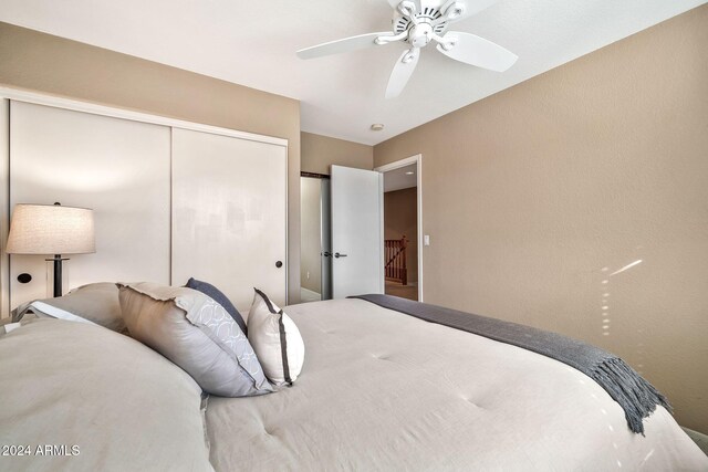 bedroom with a closet and ceiling fan