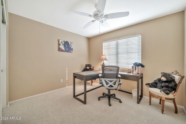 office area with light carpet and ceiling fan