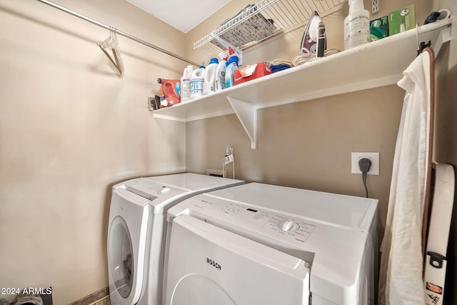 laundry room featuring washer and dryer