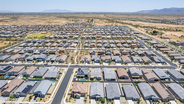 birds eye view of property featuring a mountain view