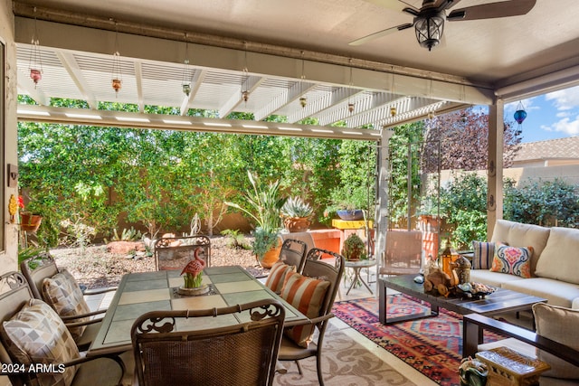 view of patio / terrace with an outdoor living space, a pergola, and ceiling fan