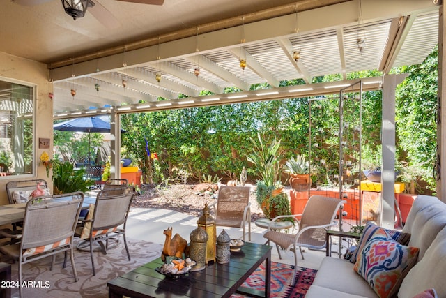 view of patio featuring a deck, a pergola, and an outdoor hangout area