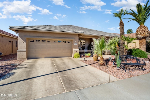 single story home with a garage