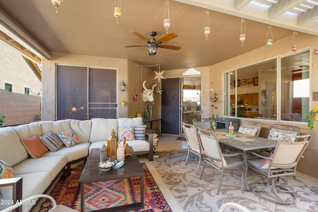 view of patio / terrace featuring ceiling fan and an outdoor hangout area