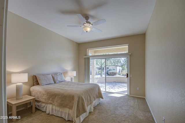 bedroom featuring light carpet, access to exterior, and ceiling fan