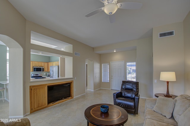 living room featuring ceiling fan