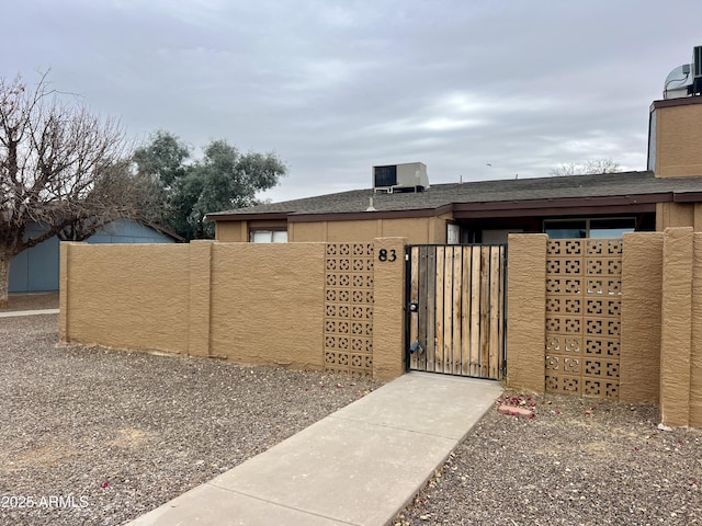 view of gate with central AC unit