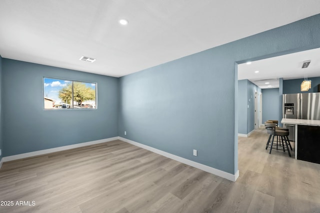 empty room featuring light hardwood / wood-style flooring