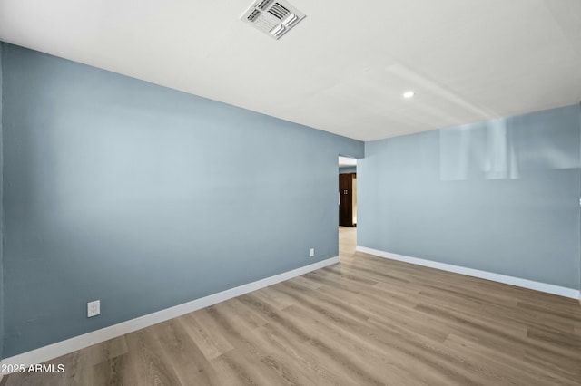 empty room featuring light hardwood / wood-style flooring