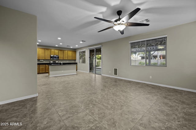1953 E Lafayette Ave, Gilbert, AZ 85298 - unfurnished living room featuring light tile patterned flooring, recessed lighting, and a ceiling fan