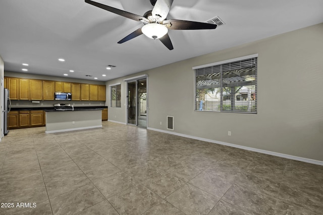 1953 E Lafayette Ave, Gilbert, AZ 85298 - unfurnished living room with recessed lighting, a ceiling fan, and light tile patterned floors
