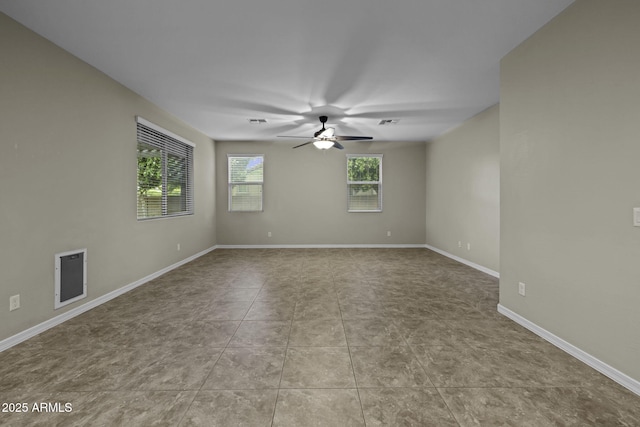 1953 E Lafayette Ave, Gilbert, AZ 85298 - tiled empty room with a ceiling fan and baseboards