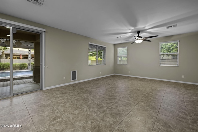 1953 E Lafayette Ave, Gilbert, AZ 85298 - tiled spare room featuring a ceiling fan and baseboards