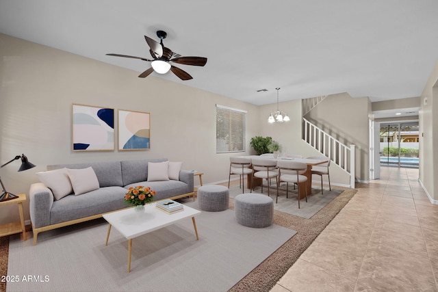 1953 E Lafayette Ave, Gilbert, AZ 85298 - living area with stairway, a chandelier, and ceiling fan