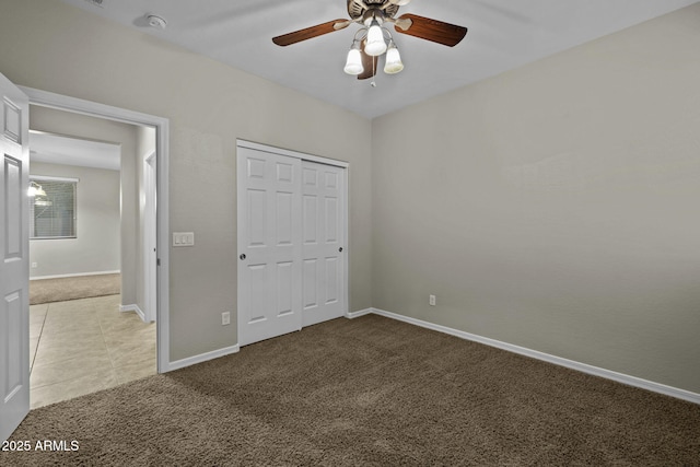 1953 E Lafayette Ave, Gilbert, AZ 85298 - unfurnished bedroom featuring light colored carpet, a closet, a ceiling fan, and light tile patterned flooring
