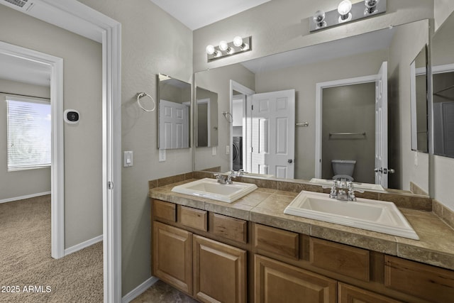 1953 E Lafayette Ave, Gilbert, AZ 85298 - bathroom featuring double vanity and toilet