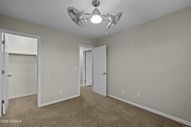1953 E Lafayette Ave, Gilbert, AZ 85298 - unfurnished bedroom with carpet floors, a spacious closet, a closet, and a ceiling fan