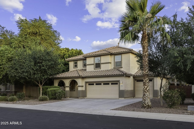 1953 E Lafayette Ave, Gilbert, AZ 85298 - mediterranean / spanish-style house with stucco siding, driveway, an attached garage, and a tile roof
