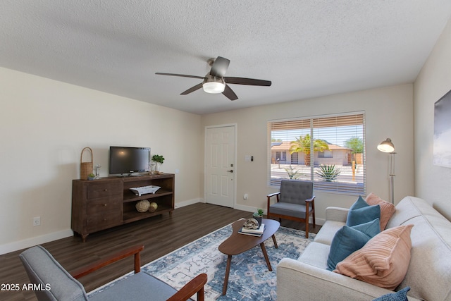 4325 W Sierra St, Glendale, AZ 85304 - living area with wood finished floors, a ceiling fan, baseboards, and a textured ceiling