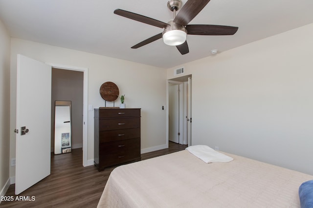 4325 W Sierra St, Glendale, AZ 85304 - bedroom with dark wood-style floors, baseboards, and a ceiling fan