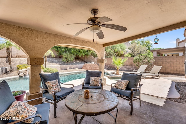 6352 W Hackamore Dr, Phoenix, AZ 85083 - fenced backyard featuring a patio area, a ceiling fan, and an outdoor living space