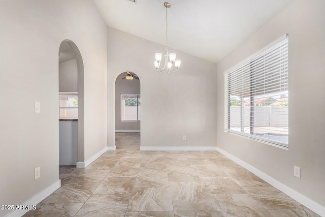 unfurnished room with an inviting chandelier and lofted ceiling