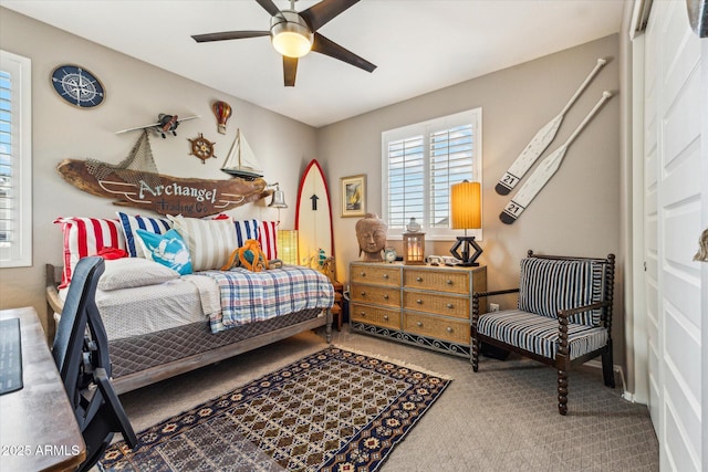 13088 N 91st Dr, Peoria, AZ 85381 - carpeted bedroom with ceiling fan